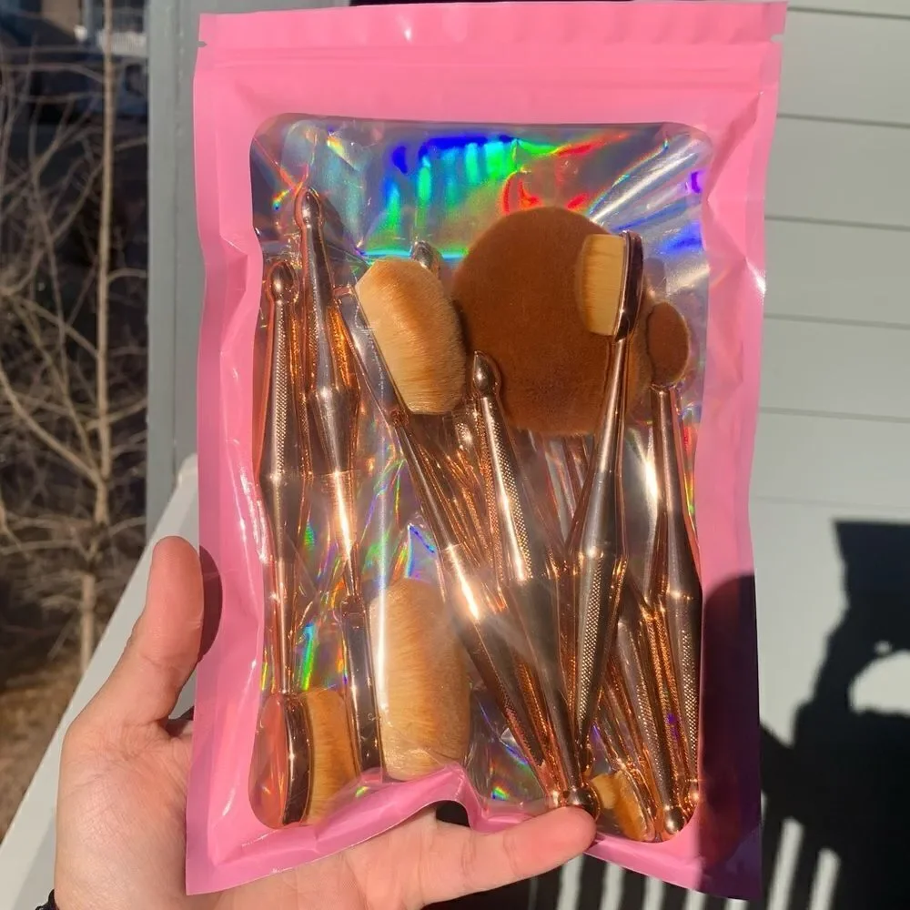 10 piece Rose gold mermaid style paddle oval brush set